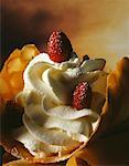 almond wafers with whipped cream and wild strawberries