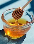 Pot of honey with honey spoon