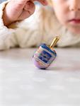 Boy Spinning Dreidel