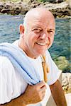 Portrait of Man With Towel and Jump Rope Around His Shoulders