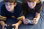 Two boys playing a video game