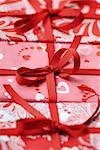 Three gift wrapped presents, cropped