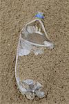 Close-up of Plastic Bottle on the Beach