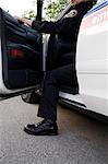 Police Woman Stepping out of Cruiser, Toronto, Ontario, Canada