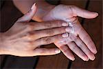 Woman's Hands with Lotion