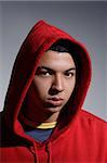young man wearing red hooded sweatshirt
