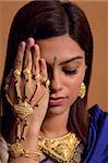 Indian woman wearing traditional wedding jewelry