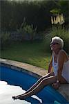 Woman Relaxing Pool Side, Mallorca, Baleares, Spain