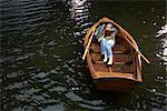 Woman Reading in Rowboat