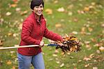 Woman Raking Leaves