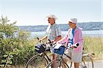Couple with their bicycles, Washington State, USA
