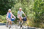 Couple riding their bicycles, Washington State, USA