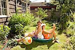 Couple holding books in a wading pool