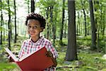 A boy holding a book