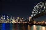 Sydney harbour bridge and skyline at night