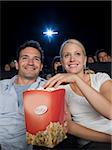A couple watching a movie