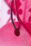 Pink gift tag, extreme close-up