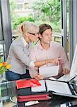 Couple working together on the computer