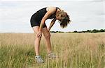 Coureur de femme épuisée au repos