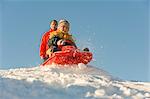 Father and Son Tobogganing, Salzburger Land, Austria