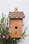 Ornate Birdhouse and Flowers