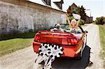 Newlyweds Driving Away in Convertible, Niagara Falls, Ontario, Canada