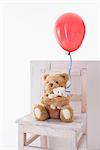 Teddy Bears with Balloon in Chair