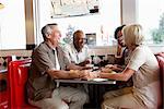 Couples Eating in Retro Diner