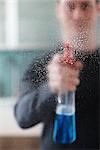 Man Cleaning Glass