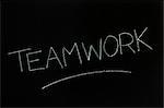 Teamwork Written on Chalkboard