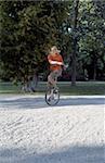 Blonde Boy on an Unicycle - Legerdemain - Youth - Leisure Time - Park