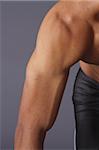 Muscular man's arm and shoulder