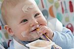 Baby with Yogurt on Face
