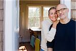 Couple outside house