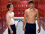 Two High School students in a locker room.