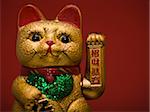 Golden asian cat toy.