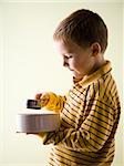 boy with a bowl and measuring cup