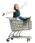 woman with a shopping cart full of money