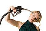 woman with gas pump to the head
