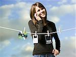 woman hanging electronics out to dry