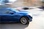 Sports Car in Motion on Street, Toronto, Ontario, Canada