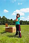 Portrait of Boy Playing With Cardboard Box