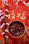 Stillleben mit Schüssel Chinesisches Neujahr-Goodies