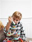 Boy making Cupcakes
