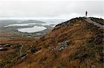 Woman on Hill, Connemara National Park, Connemara, County Galway, Ireland