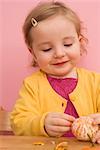 Girl Peeling Orange