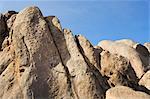 Homme descendre en rappel les grand mur, Alabama Hills, Lone Pine, comté d'Inyo, vallée d'Owens, gamme de Sierra Nevada, Californie, Etats-Unis