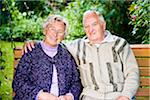 Portrait of Couple Sitting on Bench