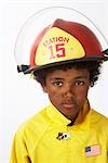 Boy Dressed as Firefighter