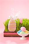 Egg Shaped Easter Cookie in Grass Filled Tray with Marshmallow Bunny and Dish of Dyed Eggs